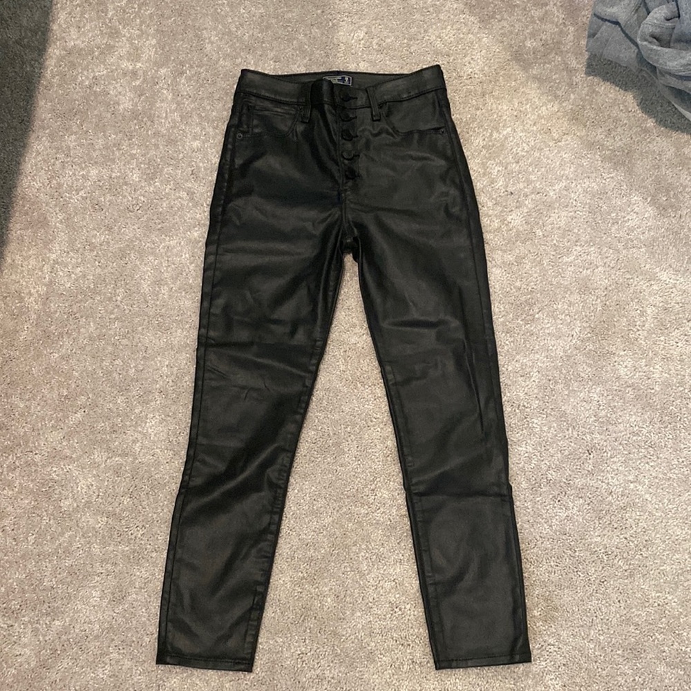 Women’s Abercrombie High Rise Super Skinny Ankle coated black jeans. Size 26